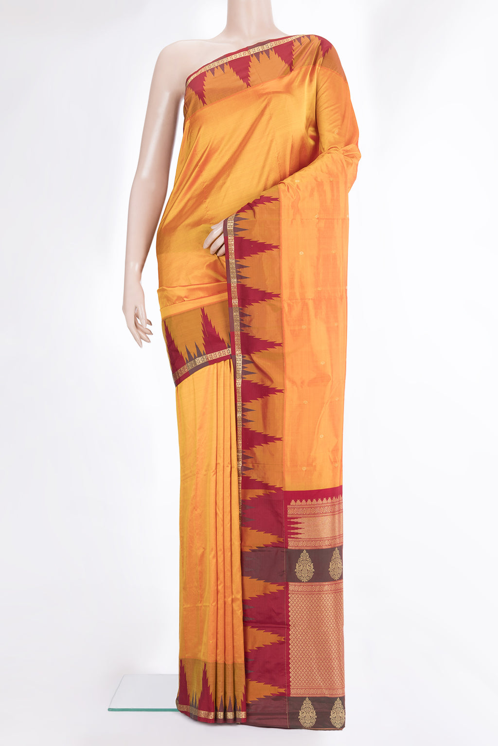Pure Silk Yellow Bangalore Saree with Zari Butta on the body and Temple Border.  displayed on a mannequin