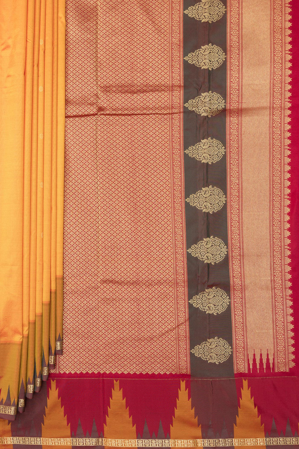 Pleats and pallu of Pure Silk Yellow Bangalore Saree with Zari Butta on the body and Temple Border. 