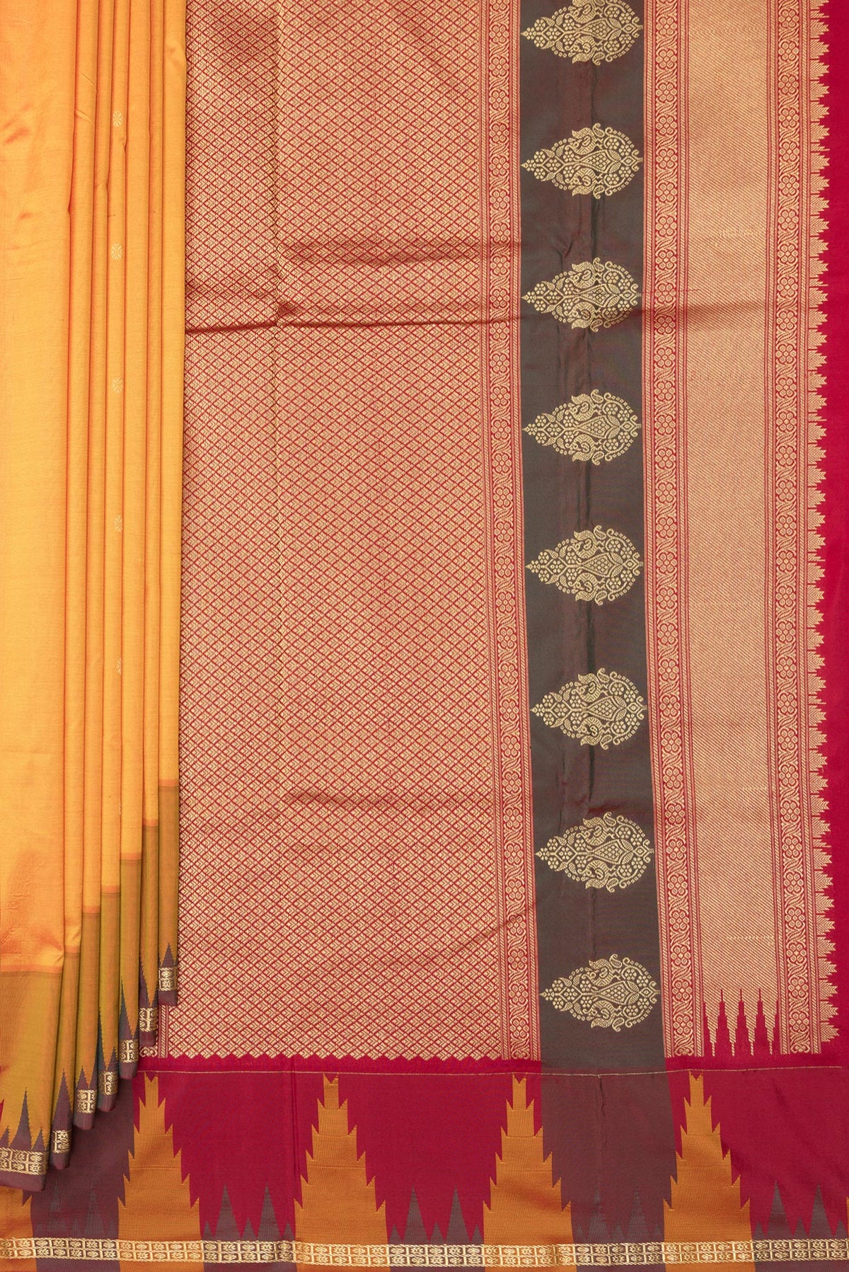 Pleats and pallu of Pure Silk Yellow Bangalore Saree with Zari Butta on the body and Temple Border. 