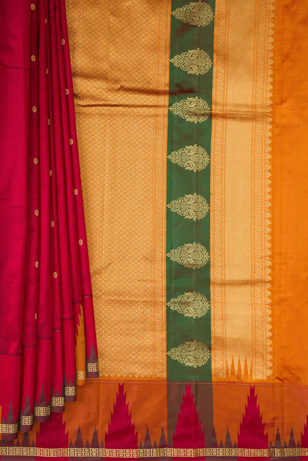 Pleats and pallu of Pure Silk Maroon Bangalore Saree with Zari Butta on the body and Temple Border. 
