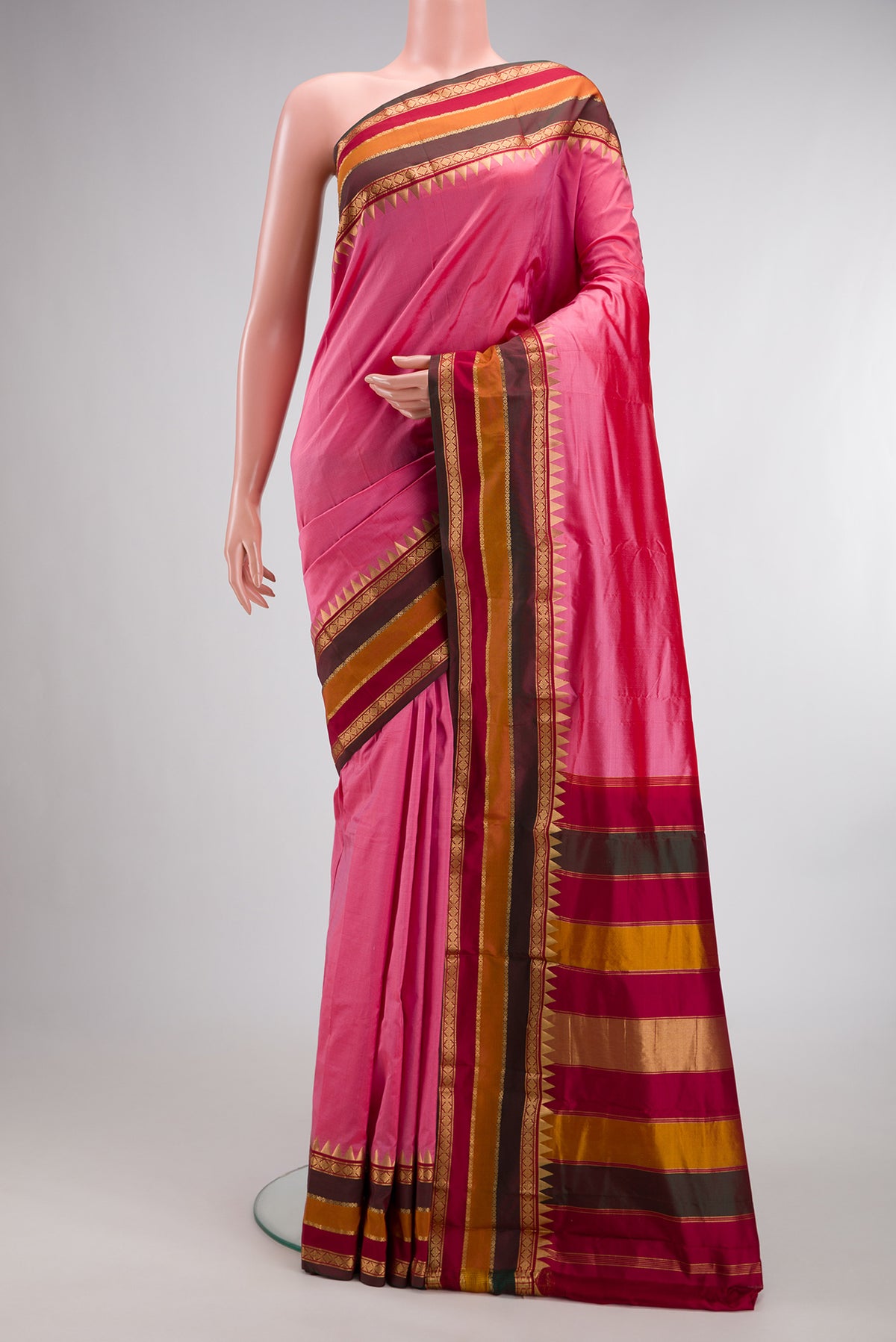 Pure Silk Pink Bangalore Saree with Plain Body and Zari Border.  displayed on a mannequin
