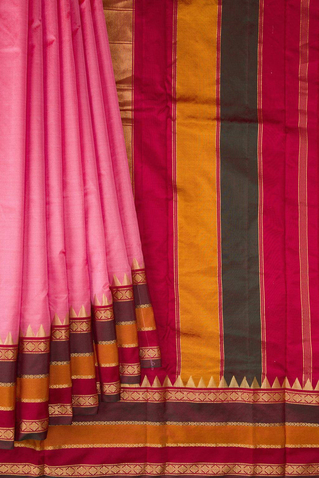 Pleats and pallu of Pure Silk Pink Bangalore Saree with Plain Body and Zari Border. 