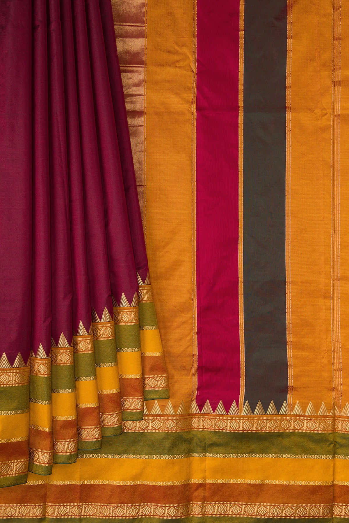 Pleats and pallu of Pure Silk Maroon Bangalore Saree with Plain Body and Temple Border. 
