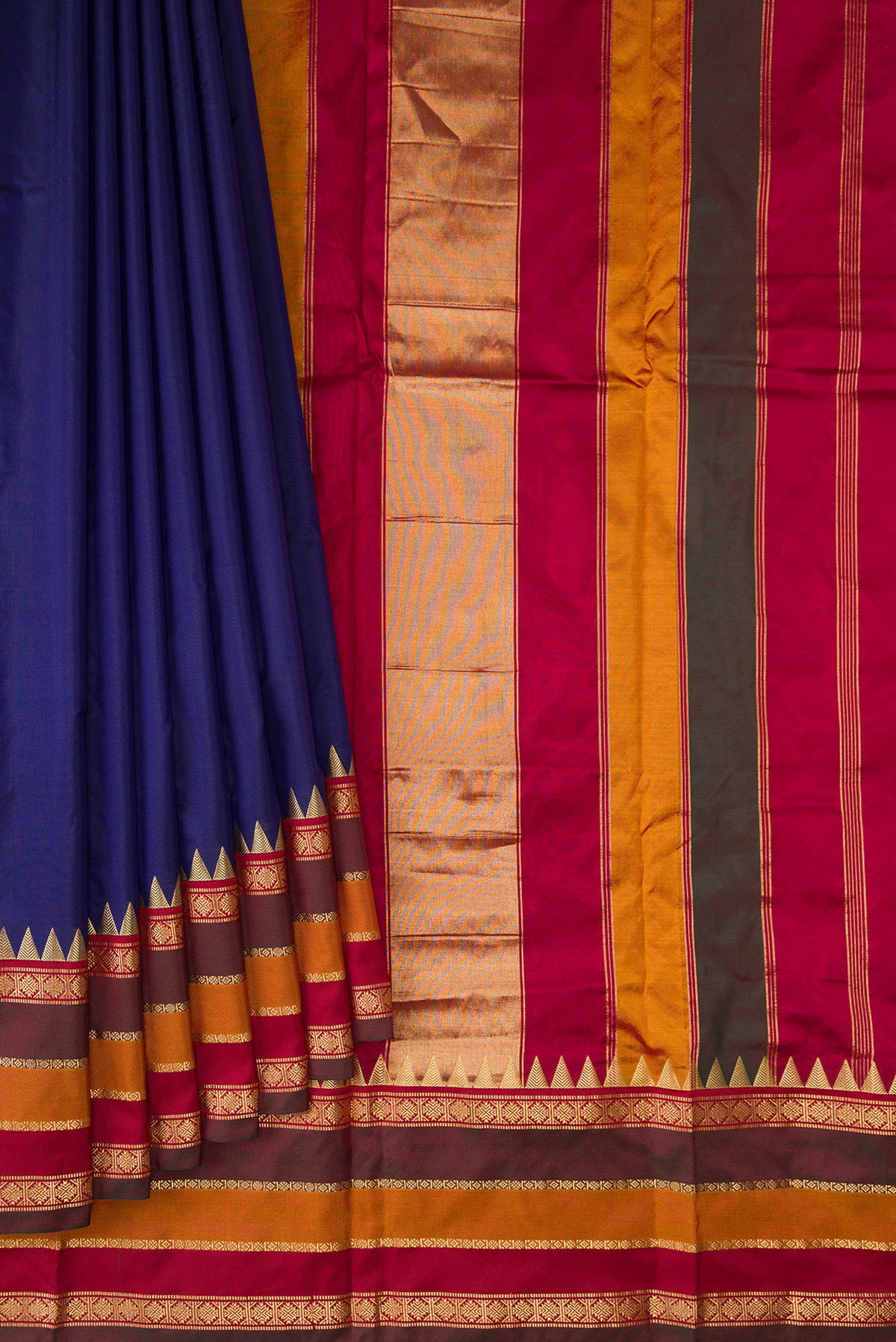 Pleats and pallu of Pure Silk Navy Blue Bangalore Saree with Plain Body and Temple Border. 