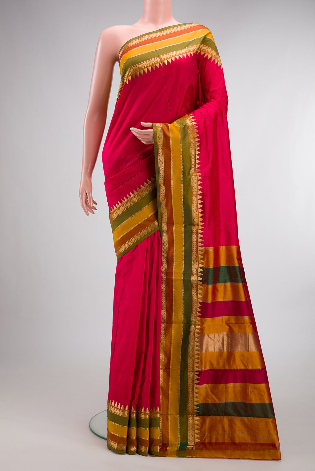 Pure Silk Dark Pink Bangalore Saree with Plain Body and Zari Border.  displayed on a mannequin