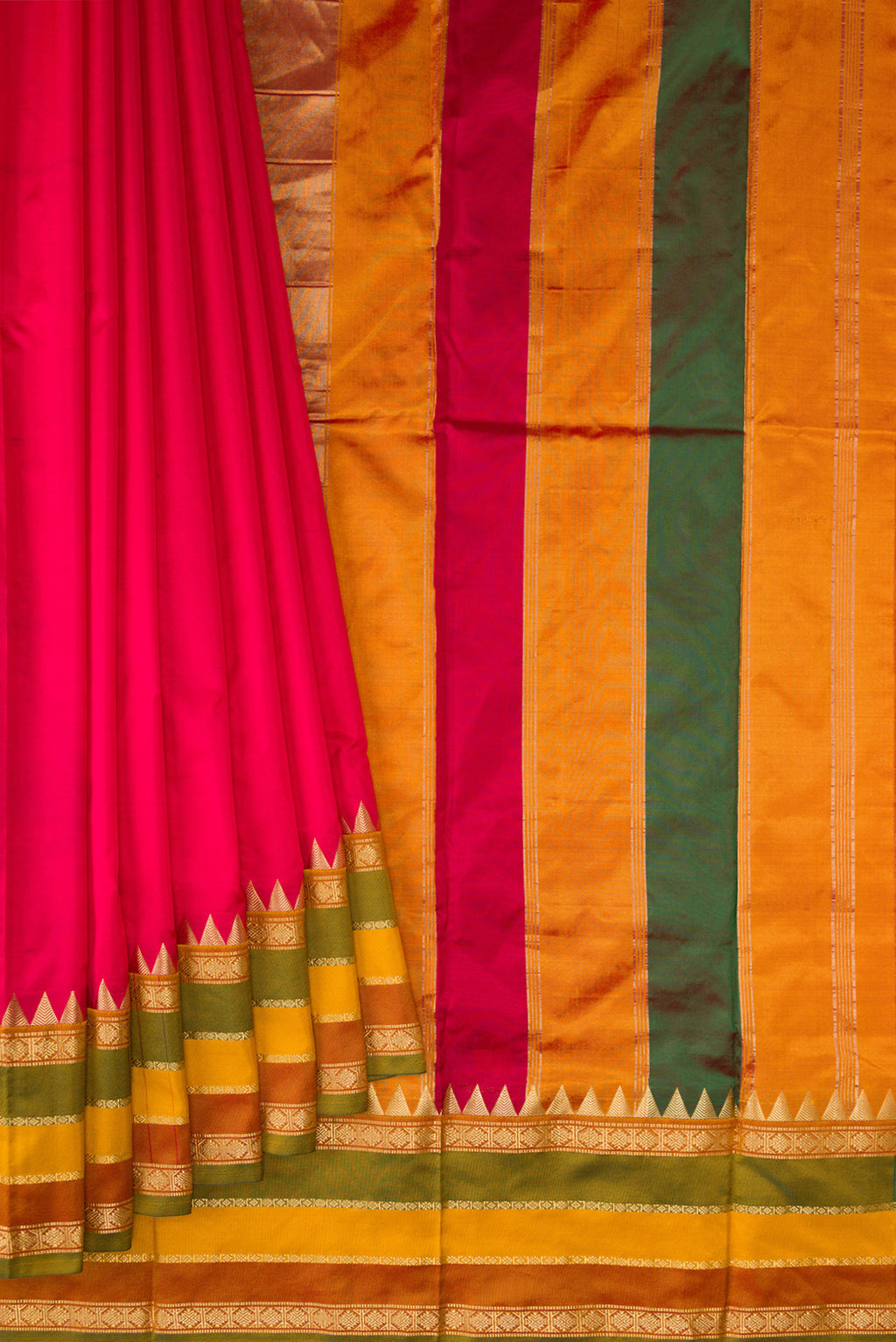 Pleats and pallu of Pure Silk Dark Pink Bangalore Saree with Plain Body and Zari Border. 