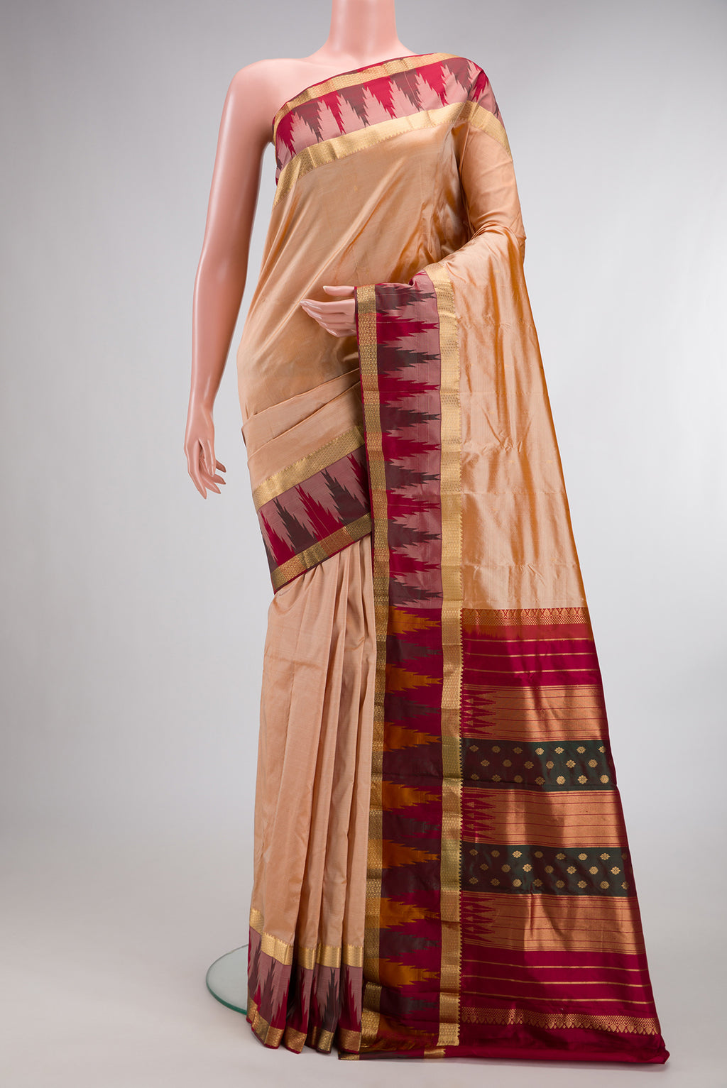 Pure Silk Sandal Bangalore Saree with Zari Butta on the body and Temple Border.  displayed on a mannequin