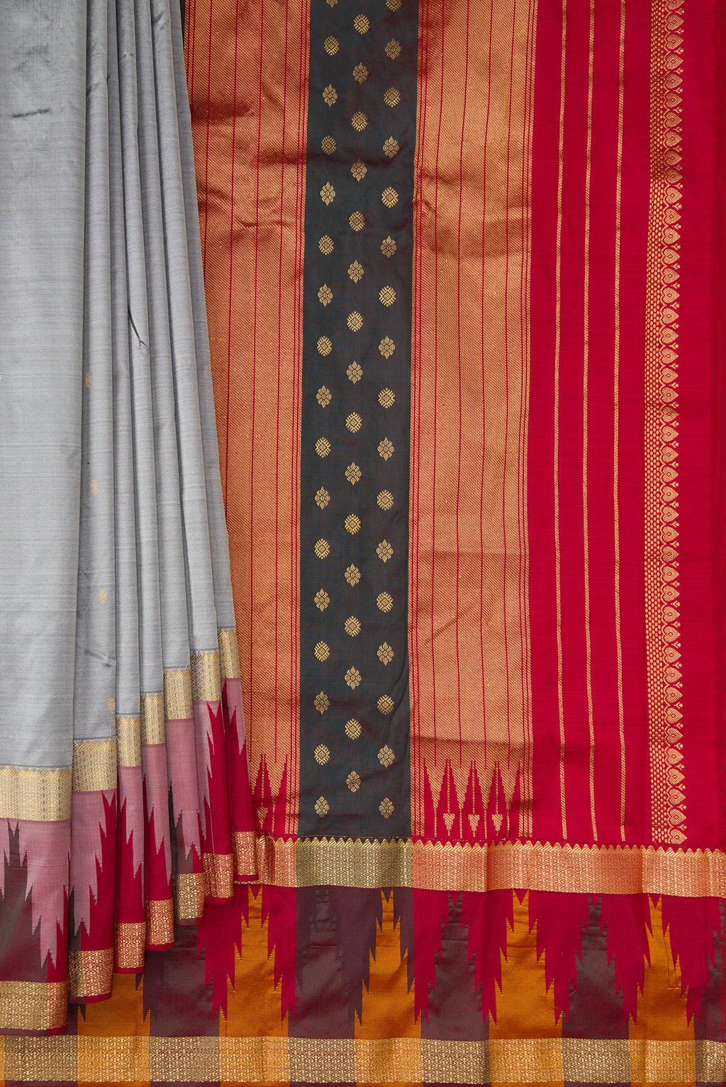 Pleats and pallu of Pure Silk Grey Bangalore Saree with Zari Butta on the body and Temple Border. 