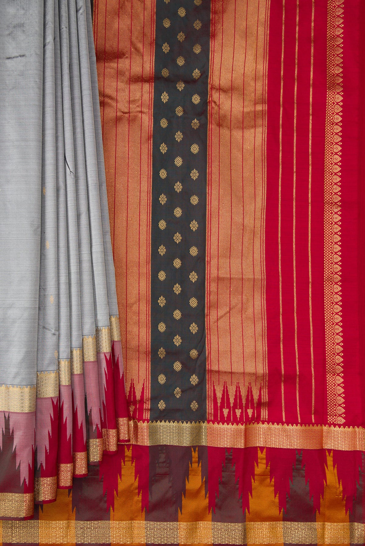 Pleats and pallu of Pure Silk Grey Bangalore Saree with Zari Butta on the body and Temple Border. 