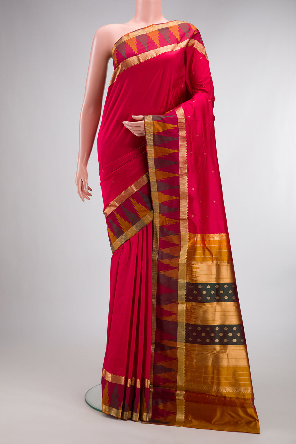 Pure Silk Red Bangalore Saree with Zari Butta on the body and Temple Border.  displayed on a mannequin