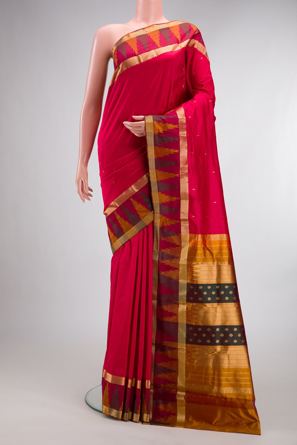 Pure Silk Red Bangalore Saree with Zari Butta on the body and Temple Border.  displayed on a mannequin