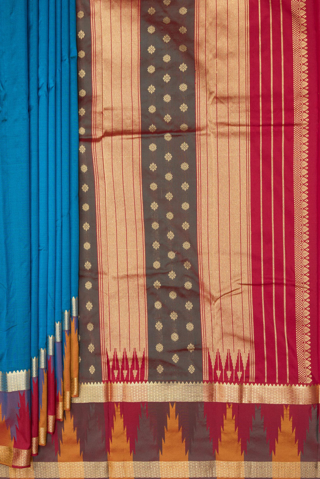 Pleats and pallu of Pure Silk Peacock Blue Bangalore Saree with Zari Butta on the body and Temple Border. 
