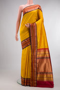 Pure Silk Yellow Bangalore Saree with Zari Butta on the body and Zari Border.  displayed on a mannequin
