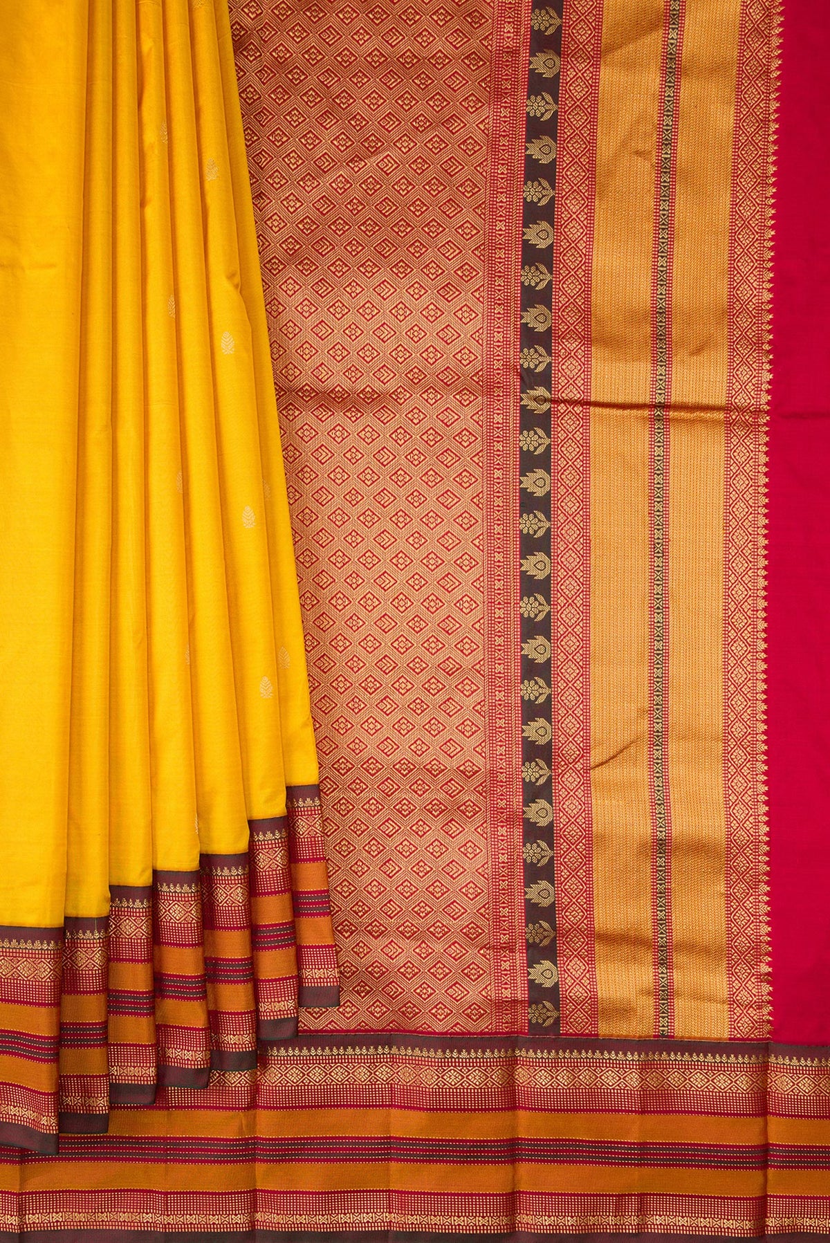 Pleats and pallu of Pure Silk Yellow Bangalore Saree with Zari Butta on the body and Zari Border. 