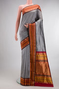Pure Silk Grey Bangalore Saree with Zari Butta on the body and Zari Border.  displayed on a mannequin