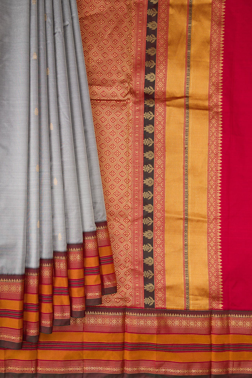 Pleats and pallu of Pure Silk Grey Bangalore Saree with Zari Butta on the body and Zari Border. 