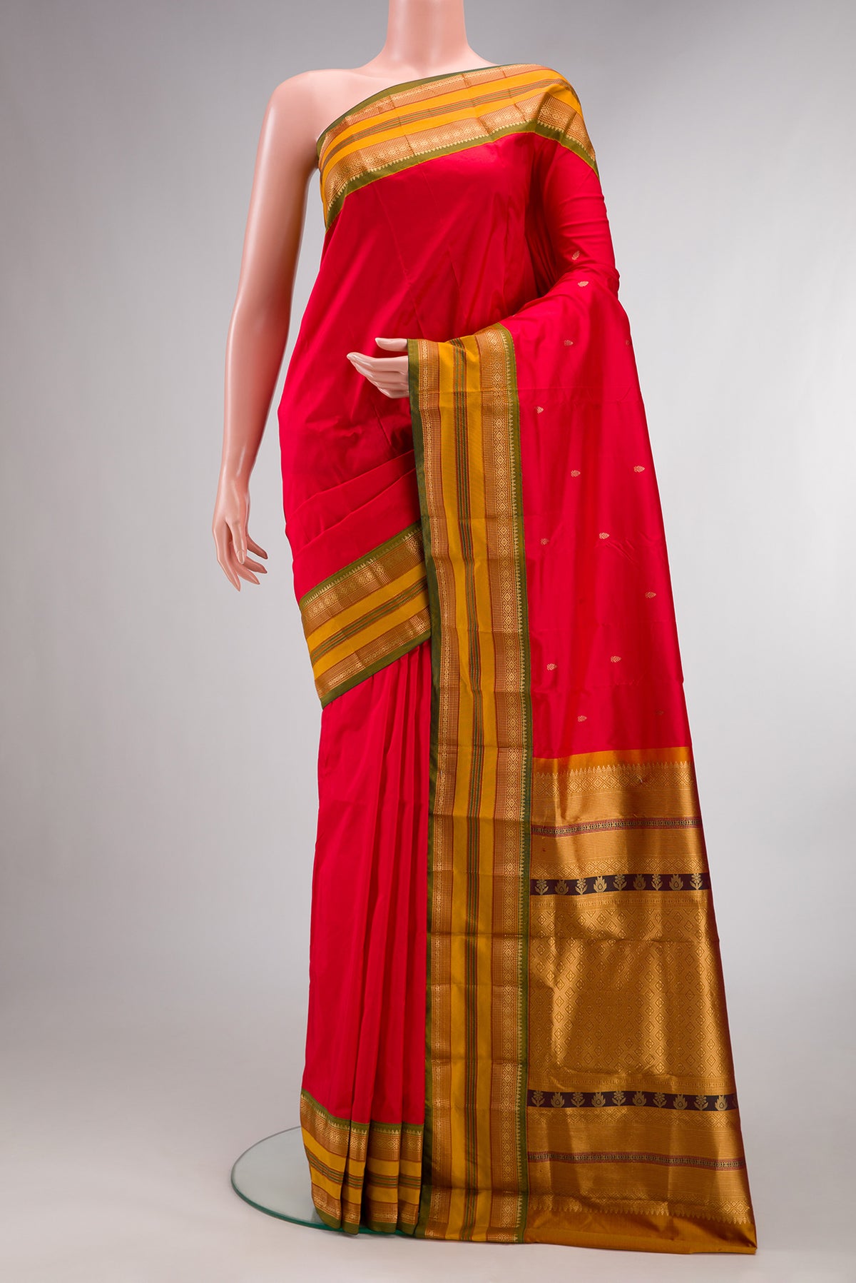 Pure Silk Red Bangalore Saree with Zari Butta on the body and Zari Border.  displayed on a mannequin