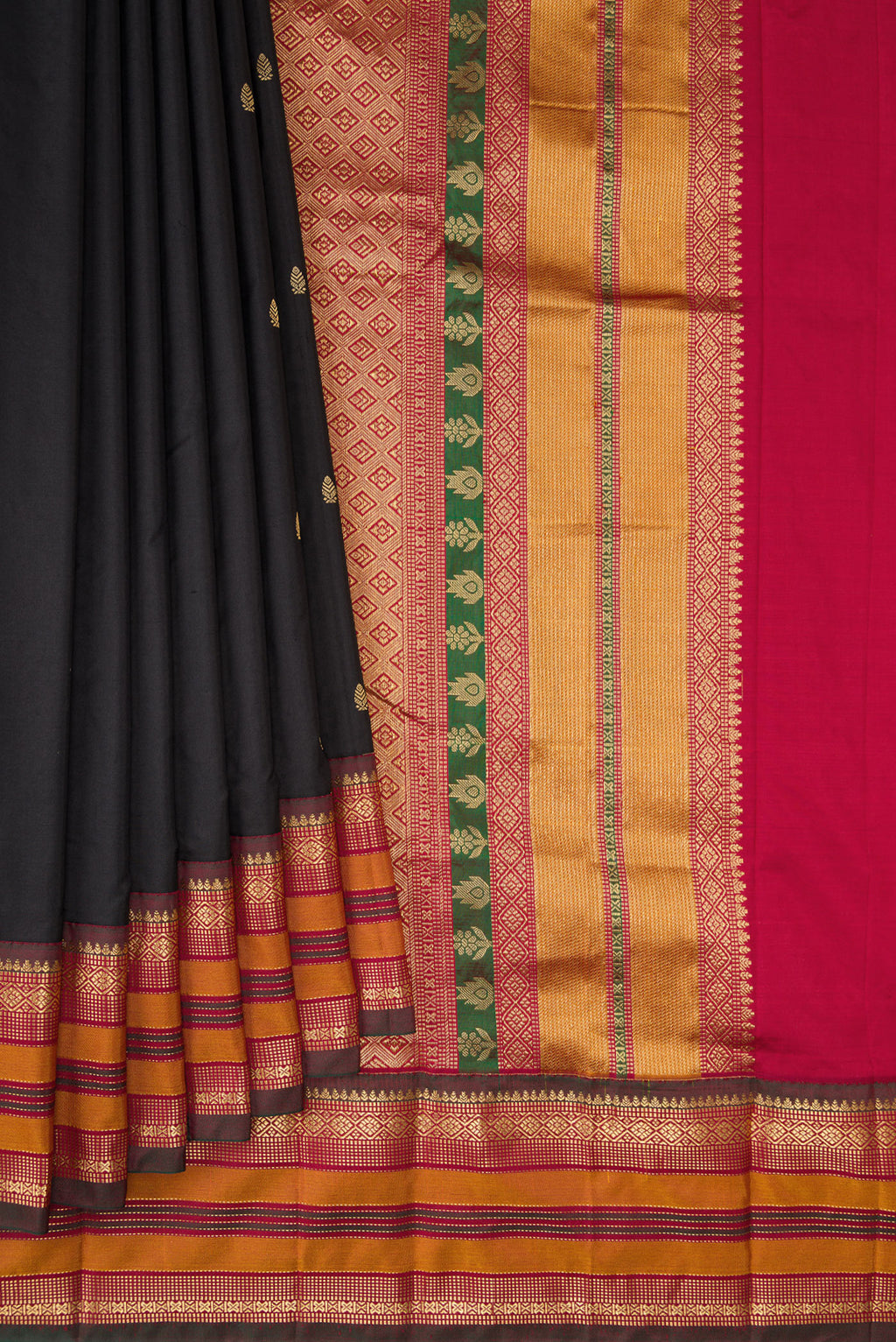 Pleats and pallu of Pure Silk Black Bangalore Saree with Zari Butta on the body and Zari Border. 
