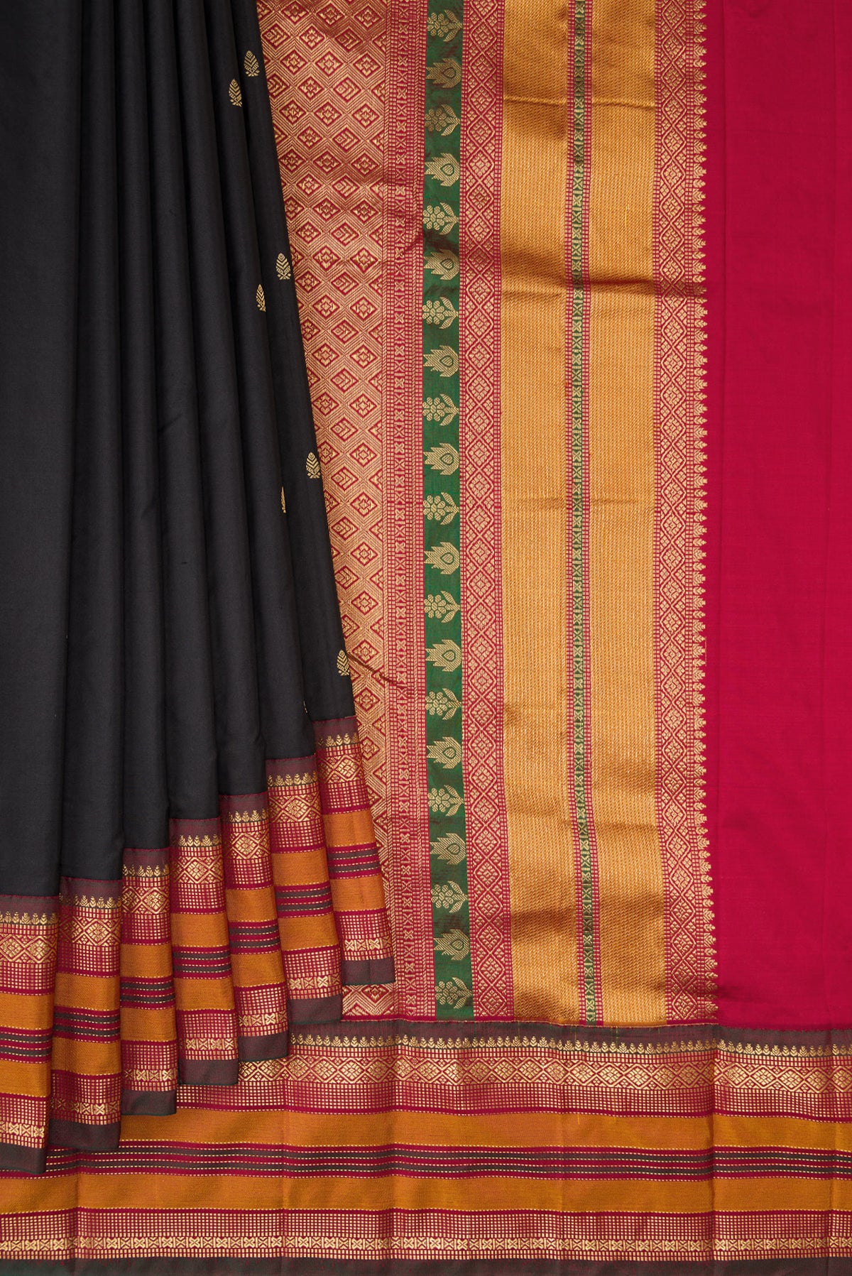 Pleats and pallu of Pure Silk Black Bangalore Saree with Zari Butta on the body and Zari Border. 