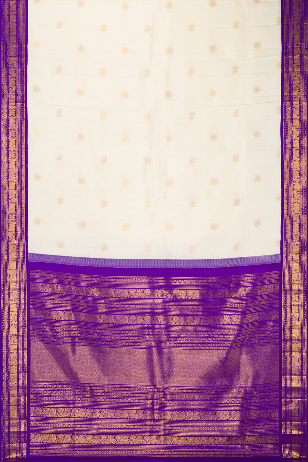 Flat view of Pure Silk Off White Kanchipuram Saree with Zari Butta on the body and Zari Border. 