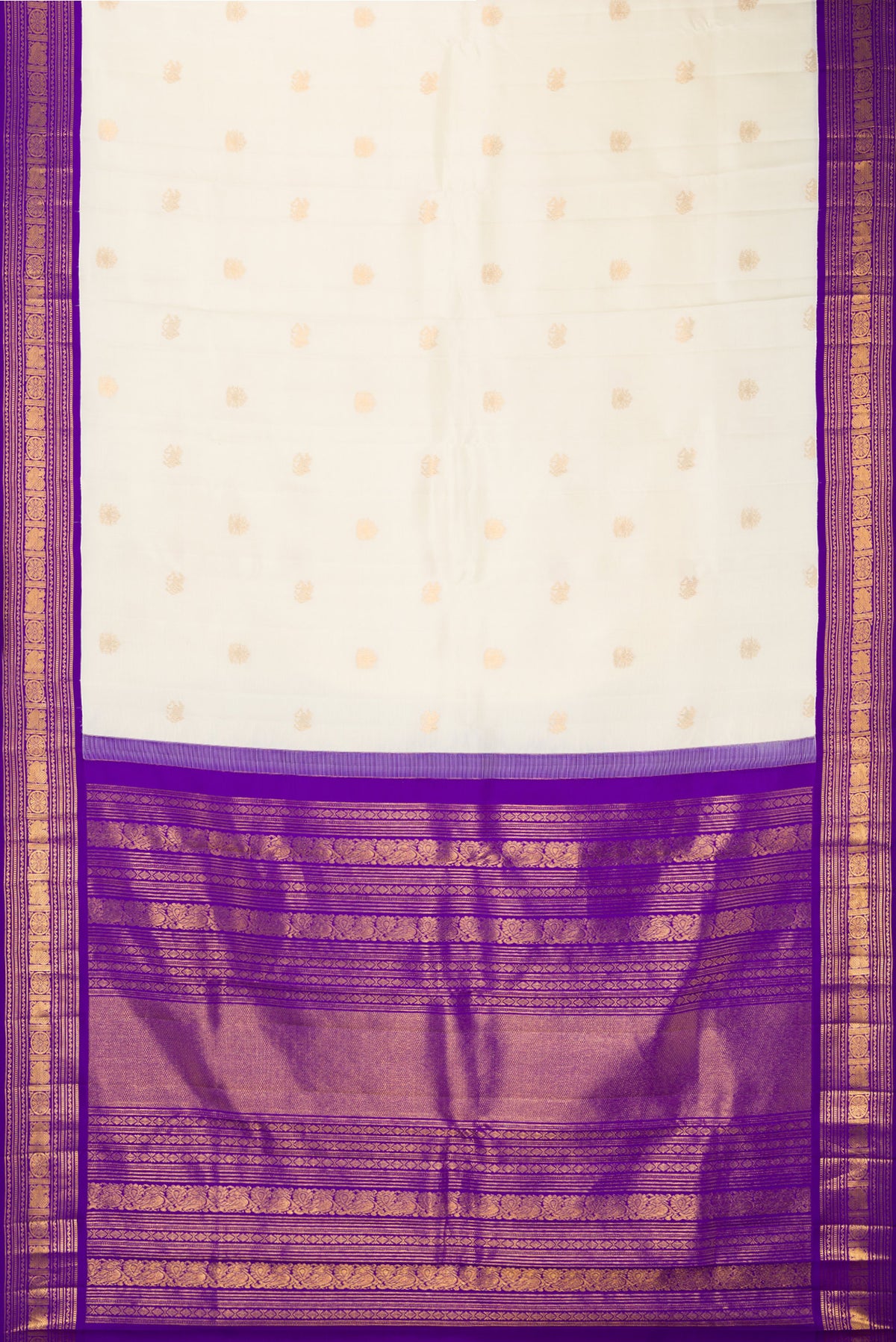 Flat view of Pure Silk Off White Kanchipuram Saree with Zari Butta on the body and Zari Border. 