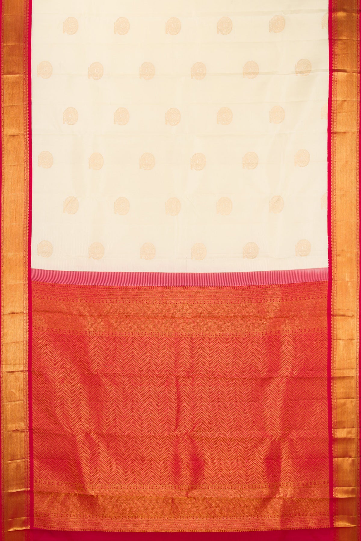Flat view of Pure Silk Cream Kanchipuram Saree with Zari Butta on the body and Zari Border. 