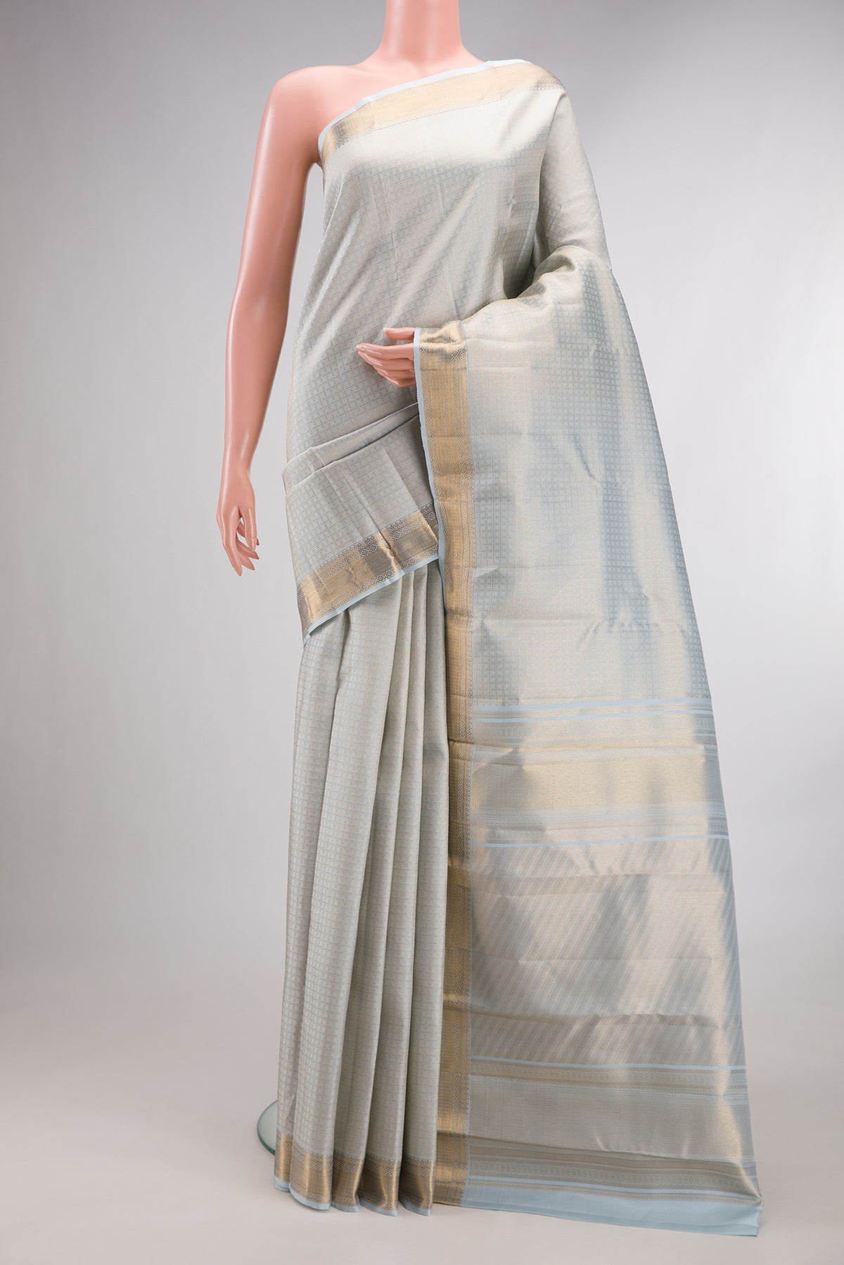 Pure Silk Blue Grey Dual Tone Kanchipuram Saree with Zari Brocade on the body and Zari Border.  displayed on a mannequin