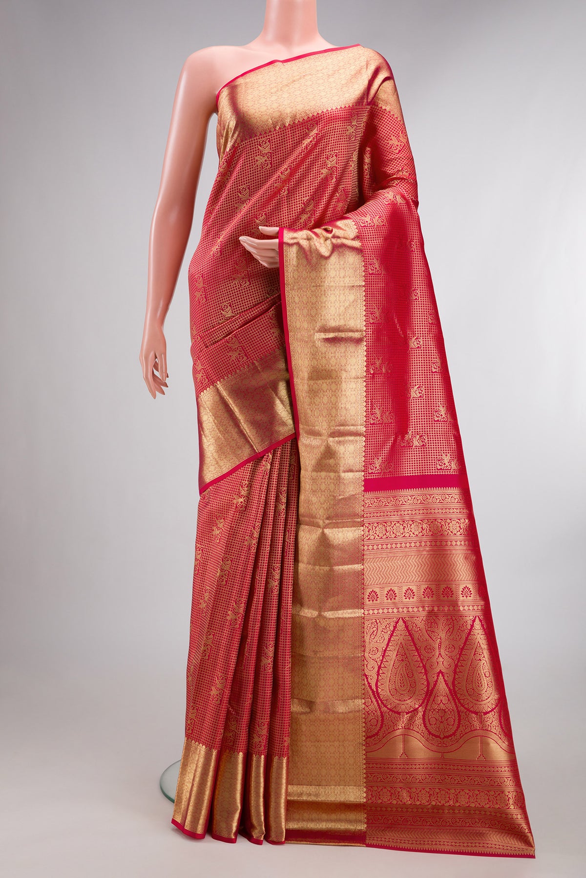 Pure Silk Dark Pink Dual Tone Kanchipuram Saree with Zari Brocade on the body and Zari Border.  displayed on a mannequin