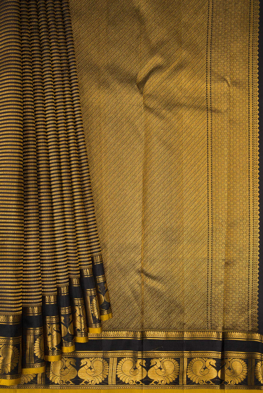 Pleats and pallu of Pure Silk Black Dual Tone Kanchipuram Saree with Stripes on the body and Fancy Border. 