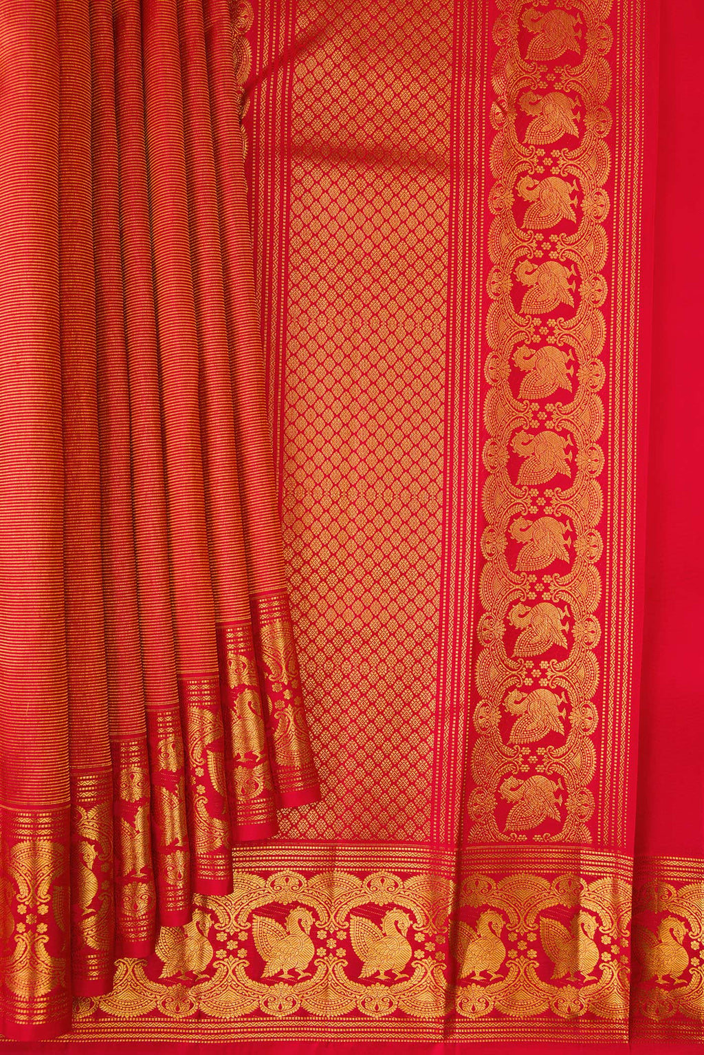 Pleats and pallu of Pure Silk Red Dual Tone Kanchipuram Saree with Zari Brocade on the body and Fancy Border. 