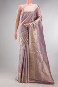 Pure Silk Lilac Dual Tone Kanchipuram Saree with Zari Brocade on the body and Zari Border.  displayed on a mannequin