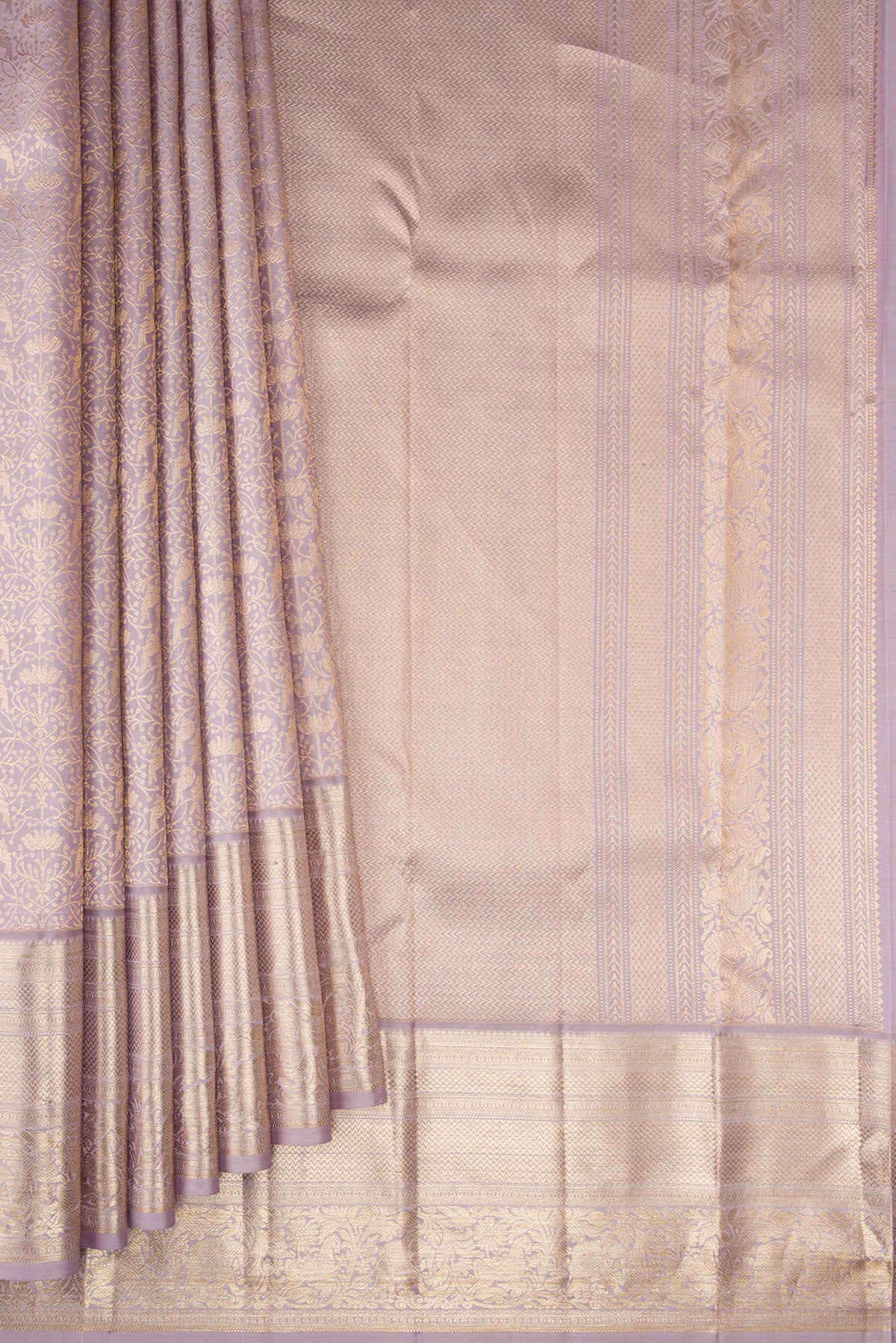 Pleats and pallu of Pure Silk Lilac Dual Tone Kanchipuram Saree with Zari Brocade on the body and Zari Border. 