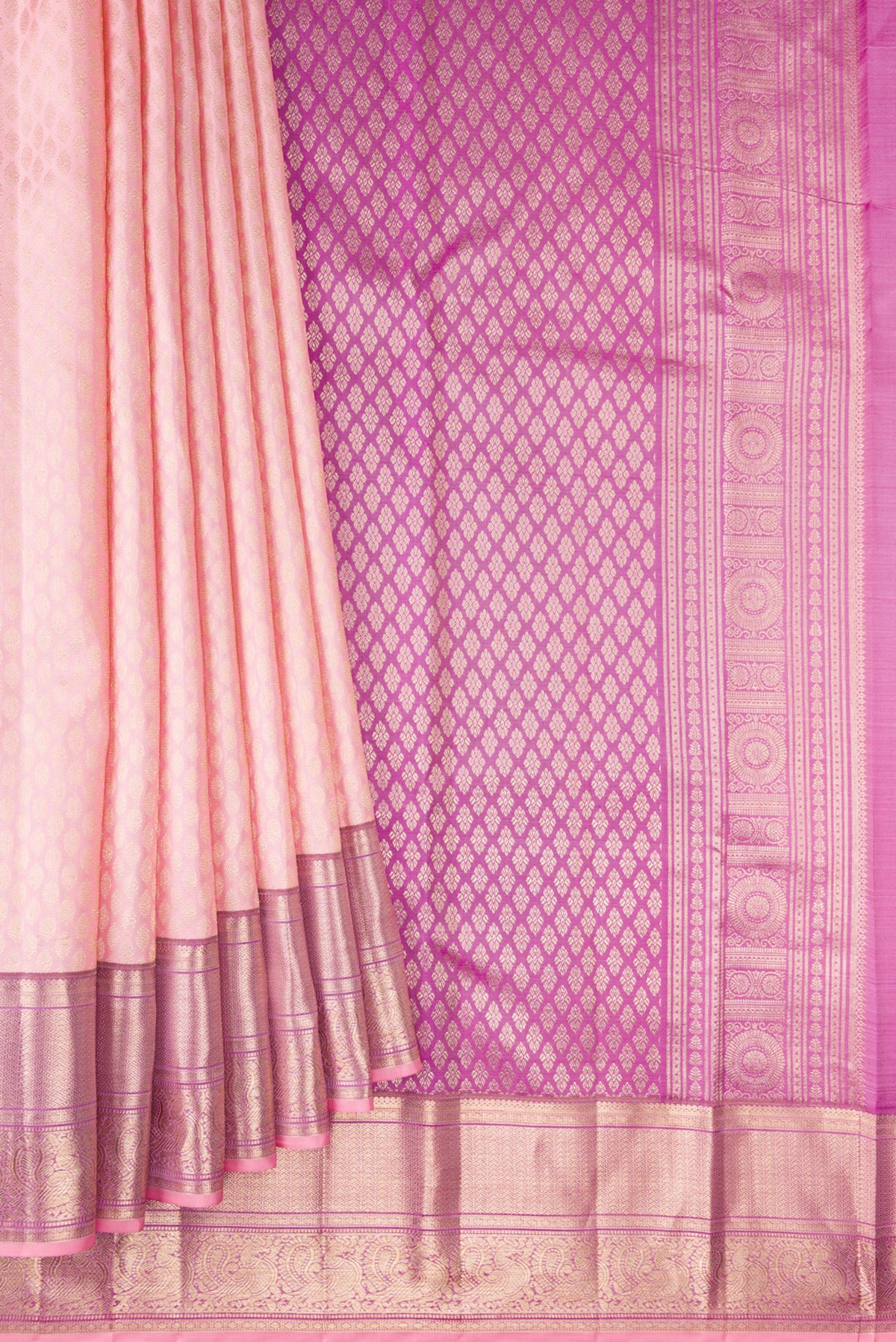 Pleats and pallu of Pure Silk Rose pink Kanchipuram Saree with Zari Brocade on the body and Fancy Border. 