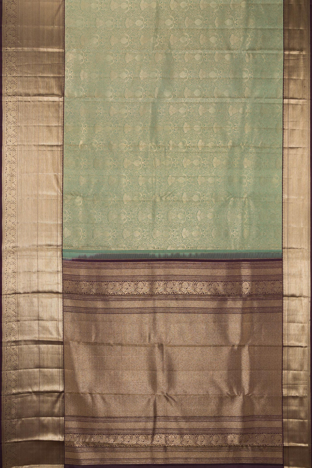 Flat view of Pure Silk Green Kanchipuram Saree with Zari Brocade on the body and Zari Border. 