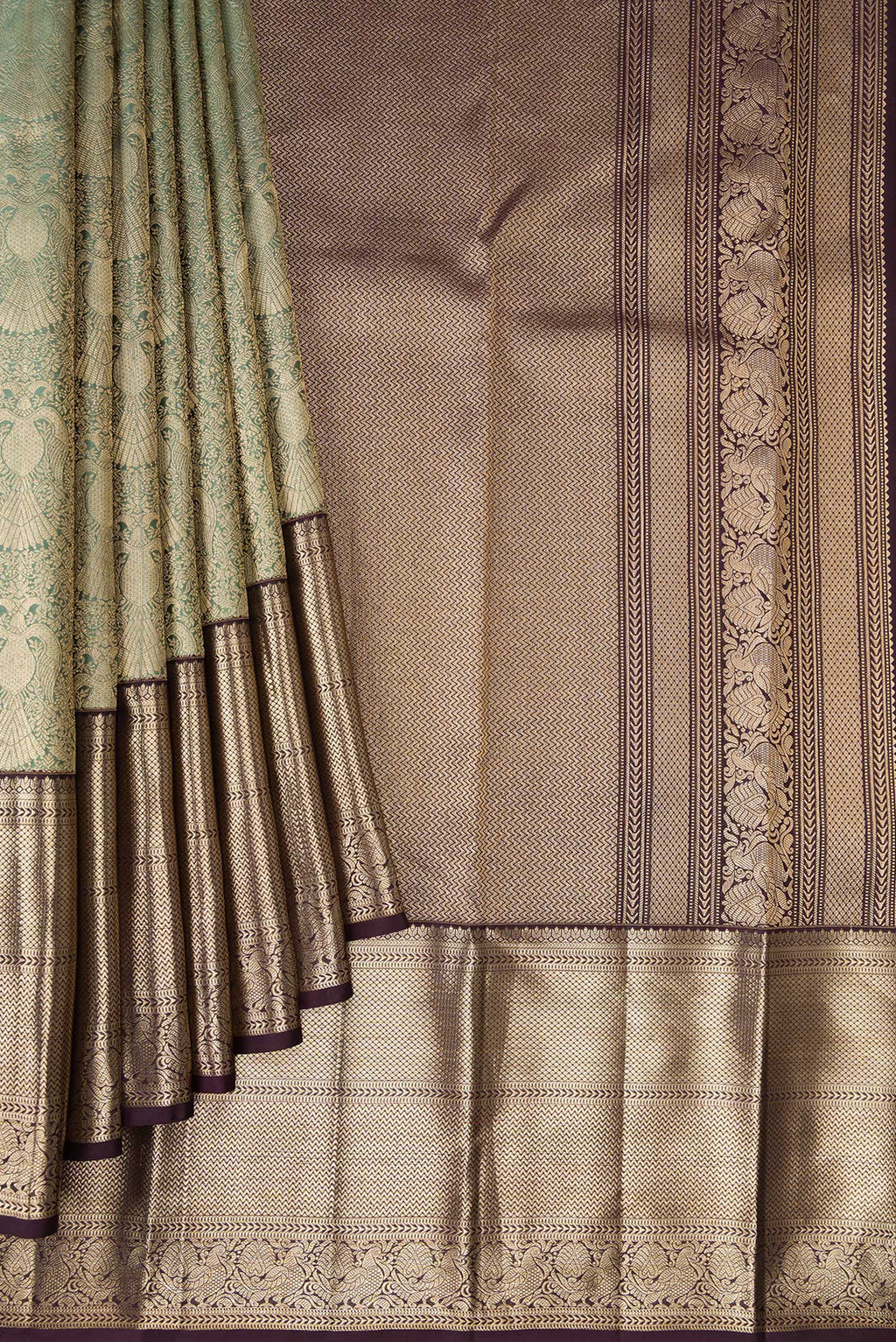 Pleats and pallu of Pure Silk Green Kanchipuram Saree with Zari Brocade on the body and Zari Border. 