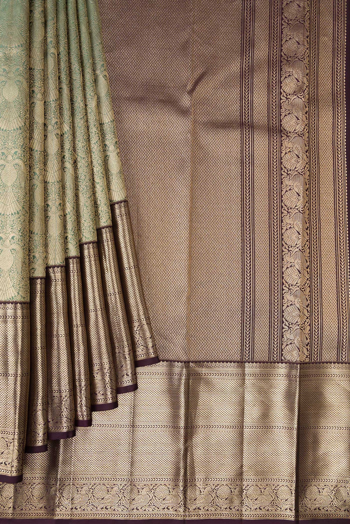 Pleats and pallu of Pure Silk Green Kanchipuram Saree with Zari Brocade on the body and Zari Border. 