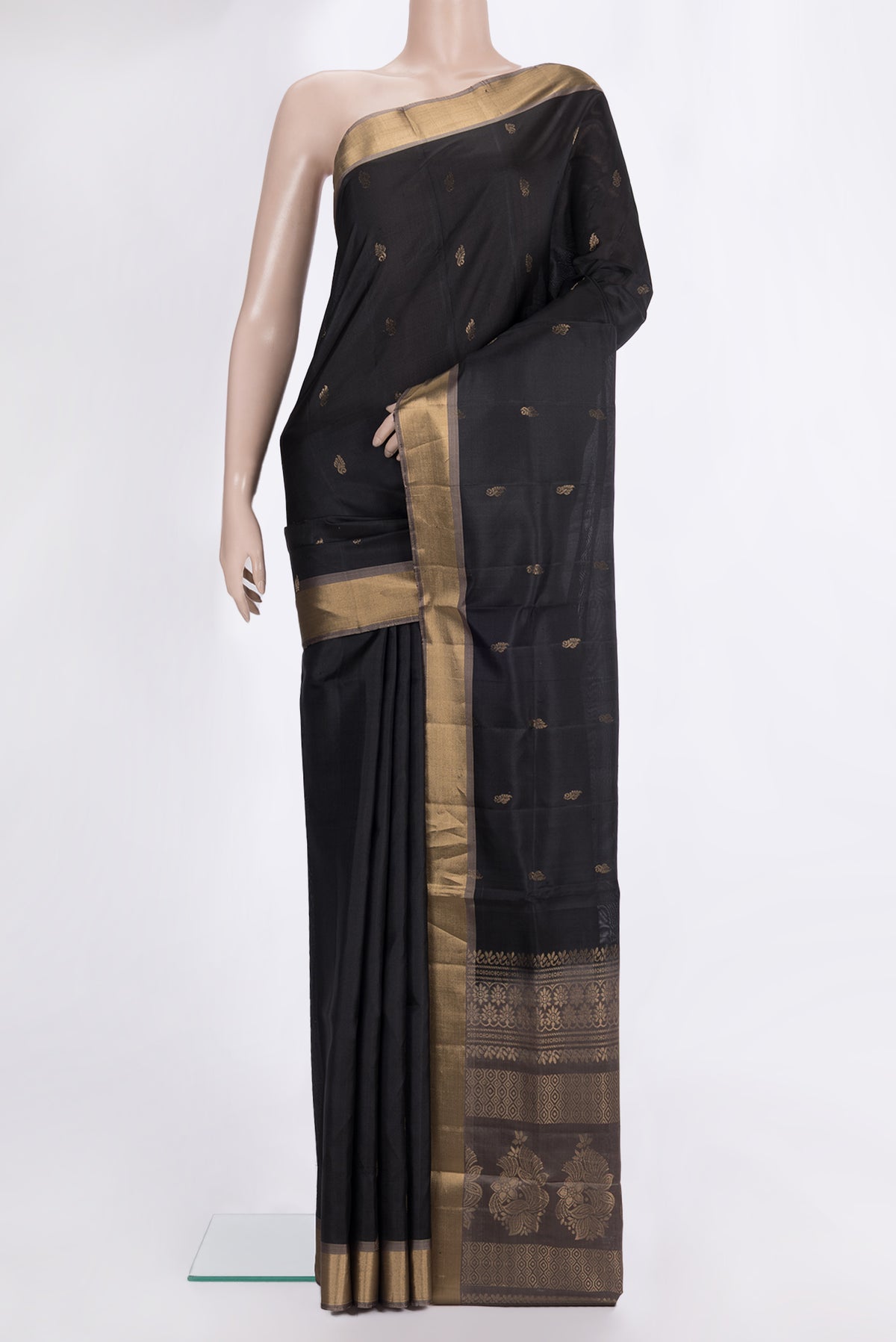Pure Silk Black Dual Tone Soft Saree with Zari Butta on the body and Zari Border.  displayed on a mannequin