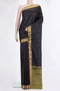 Pure Silk Black Soft Saree with Zari Butta on the body and Zari Border.  displayed on a mannequin