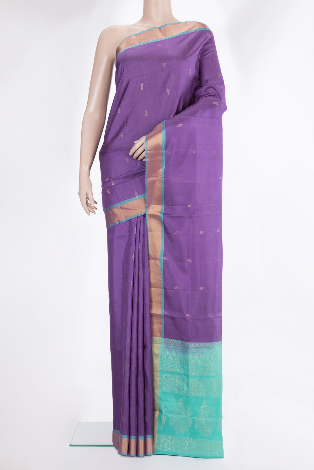 Pure Silk Lavender Soft Saree with Zari Butta on the body and Zari Border.  displayed on a mannequin
