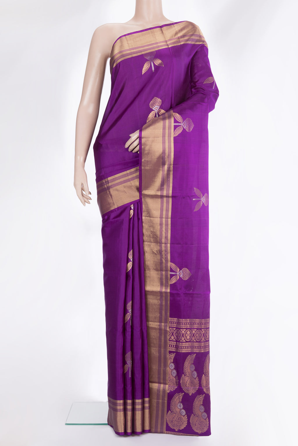 Pure Silk Purple Soft Saree with Zari Butta on the body and Zari Border.  displayed on a mannequin
