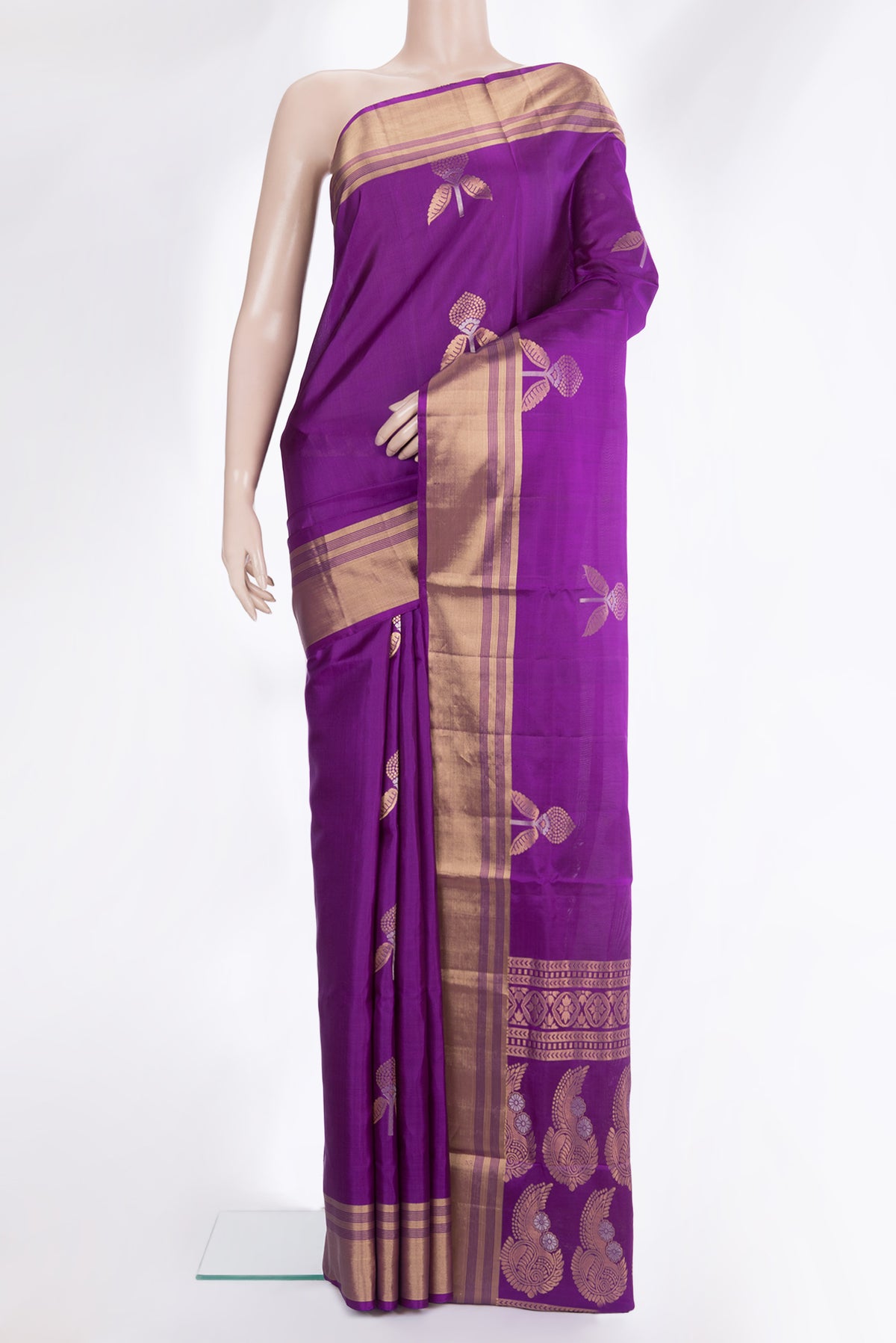 Pure Silk Purple Soft Saree with Zari Butta on the body and Zari Border.  displayed on a mannequin