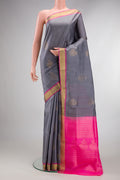 Pure Silk Grey Soft Saree with Zari Butta on the body and Zari Border.  displayed on a mannequin