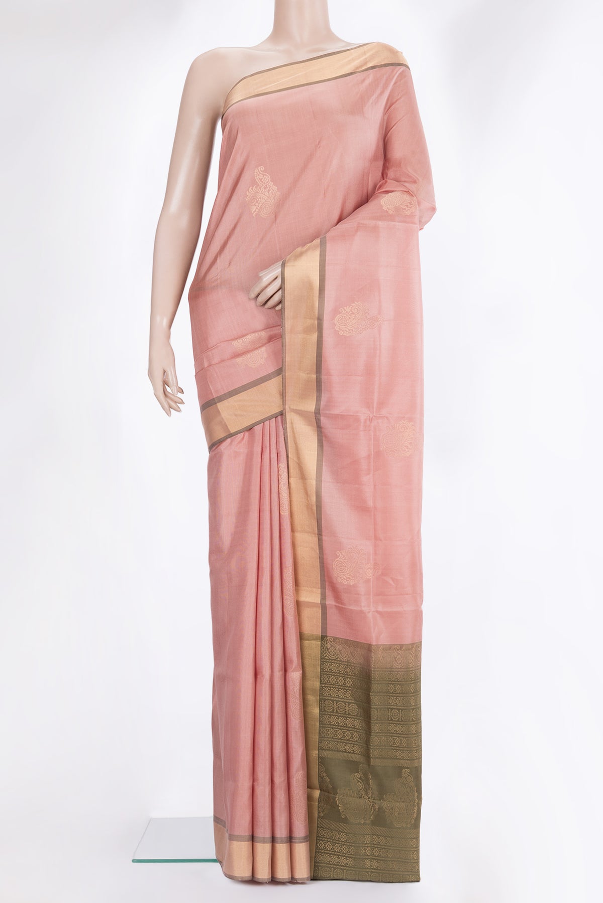 Pure Silk Golden Peach Soft Saree with Zari Butta on the body and Zari Border.  displayed on a mannequin