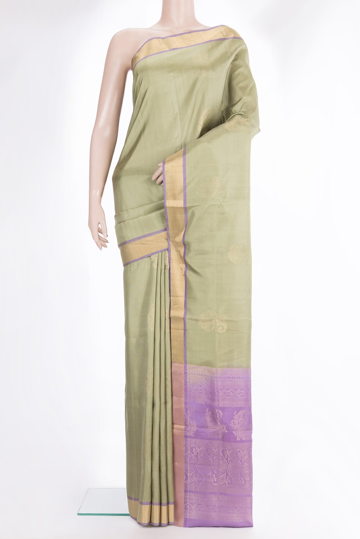 Pure Silk Beige Soft Saree with Zari Butta on the body and Zari Border.  displayed on a mannequin