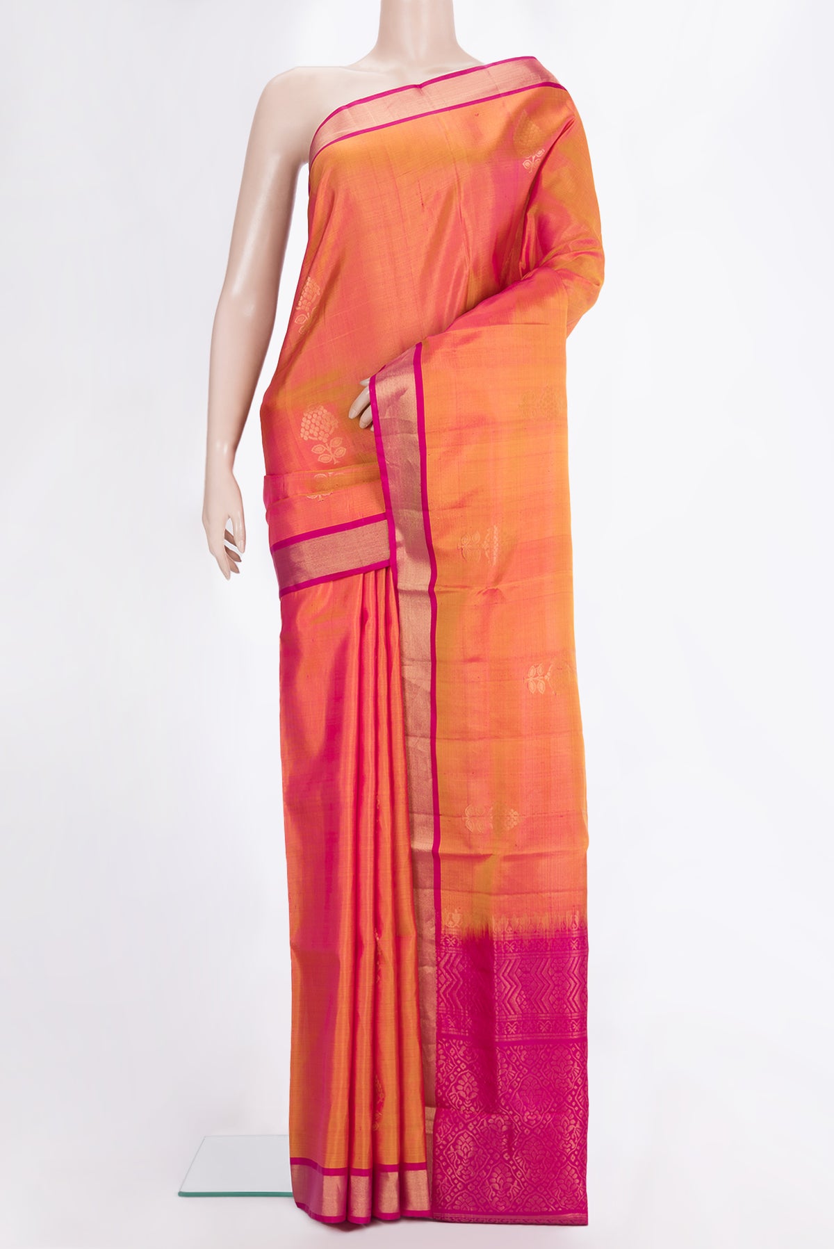 Pure Silk Pinkish Yellow Dual Tone Soft Saree with Zari Butta on the body and Zari Border.  displayed on a mannequin
