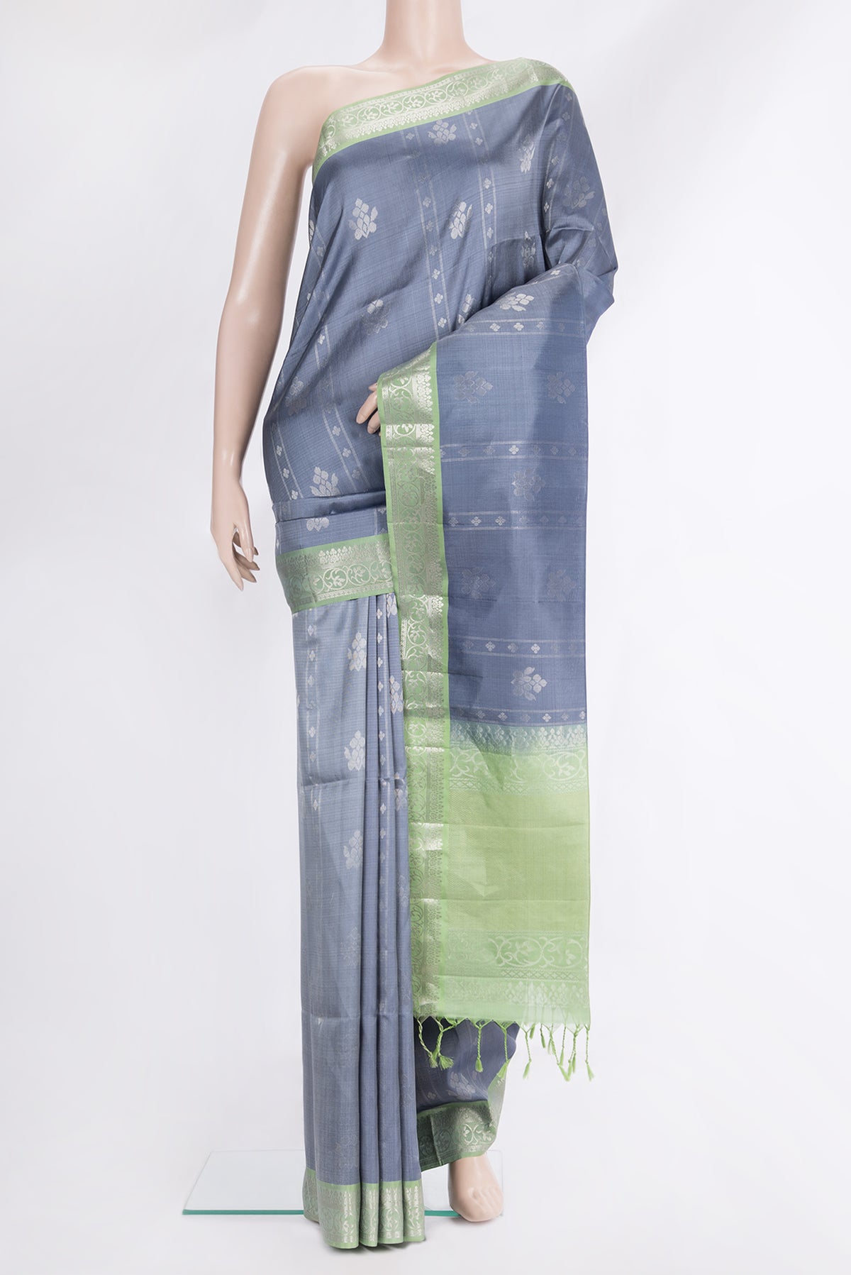 Pure Silk Grey Dual Tone Soft Saree with Zari Butta on the body and Zari Border.  displayed on a mannequin