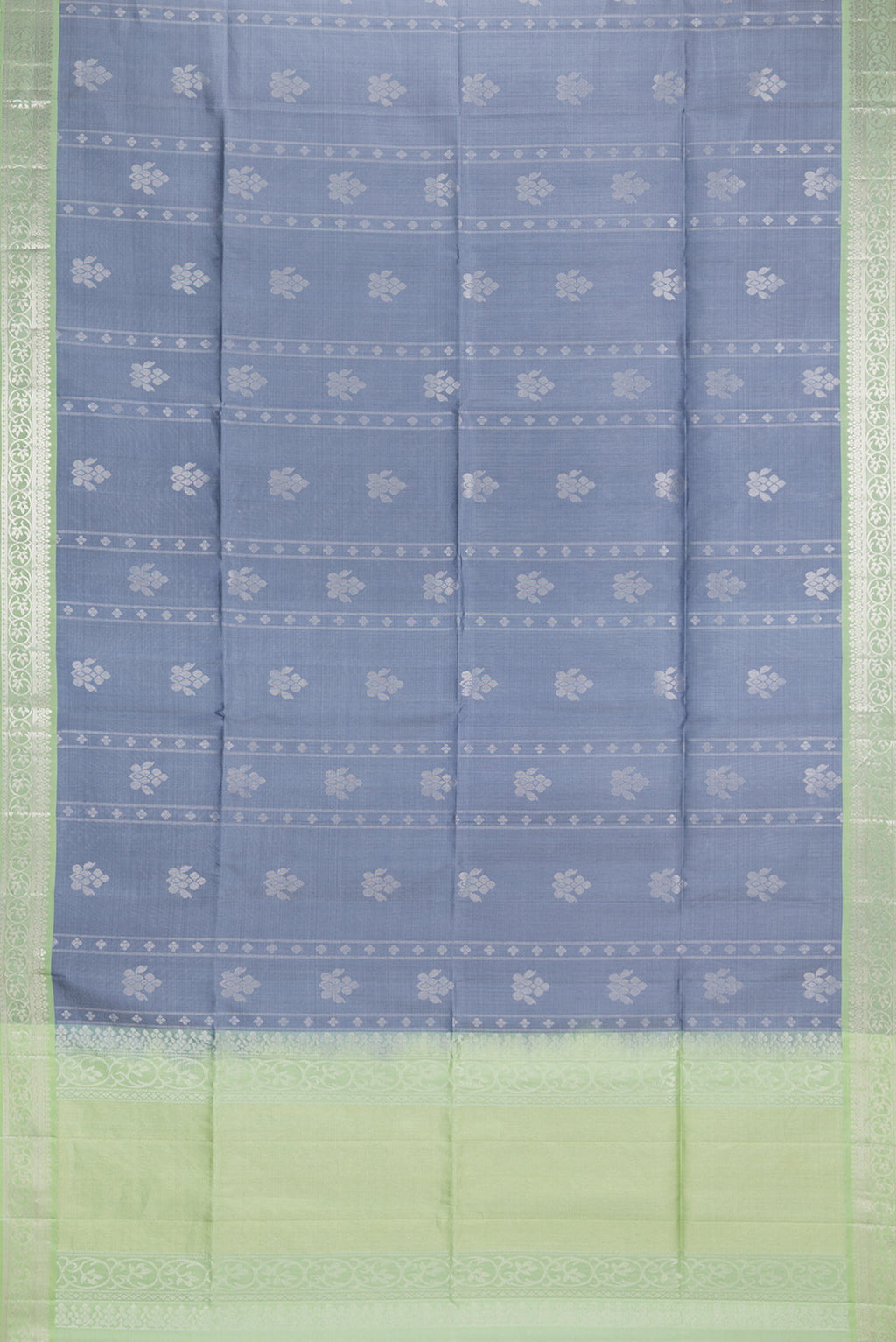 Flat view of Pure Silk Grey Dual Tone Soft Saree with Zari Butta on the body and Zari Border. 