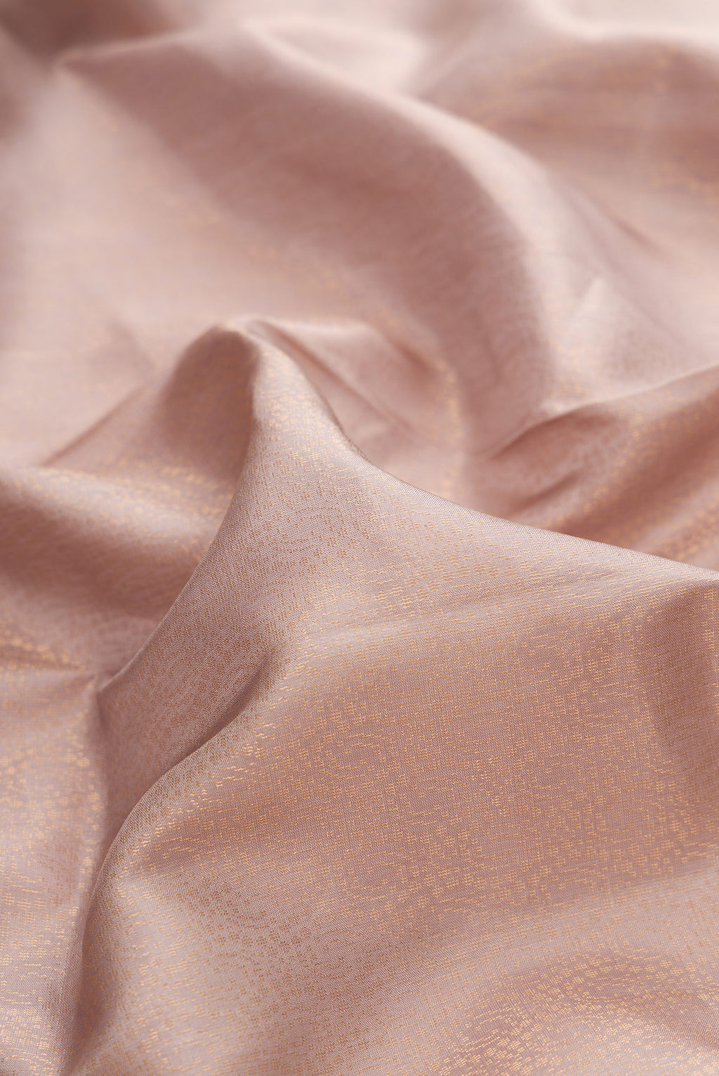 Close up of Pure Silk Dark Beige Soft Saree with Zari Brocade on the body and Fancy Border.  displaying folds