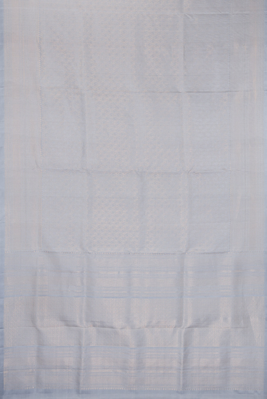 Flat view of Pure Silk Light Blue Soft Saree with Zari Brocade on the body and Fancy Border. 