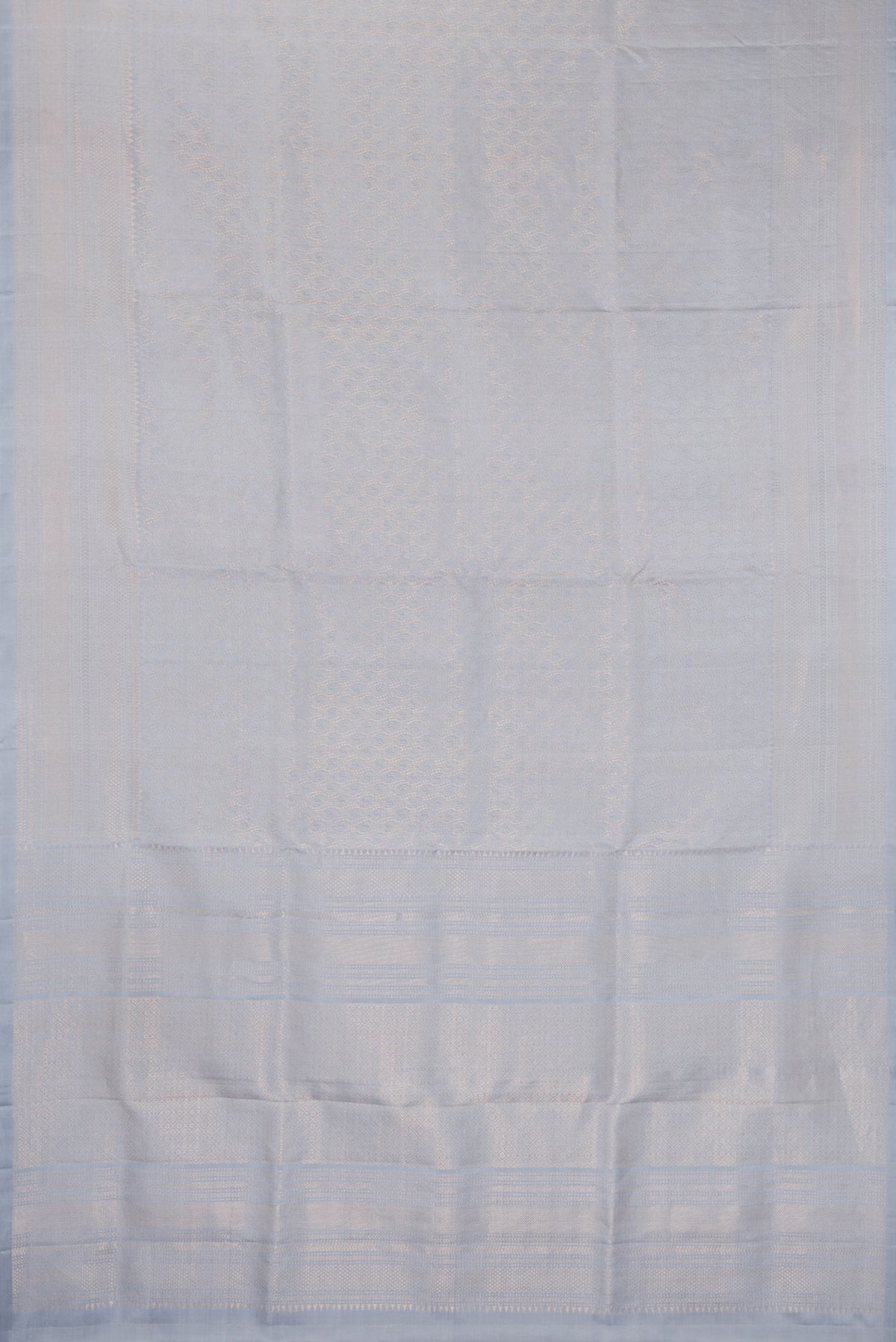 Flat view of Pure Silk Light Blue Soft Saree with Zari Brocade on the body and Fancy Border. 
